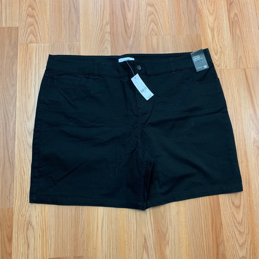 Black twill shorts.